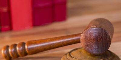 Close-up of judges gavel on a table